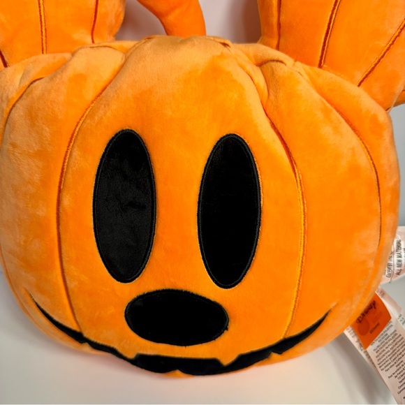 decorative throw pillow in the shape of a Mickey Mouse Pumpkin jack-o'-Lantern. - Picture 4 of 12